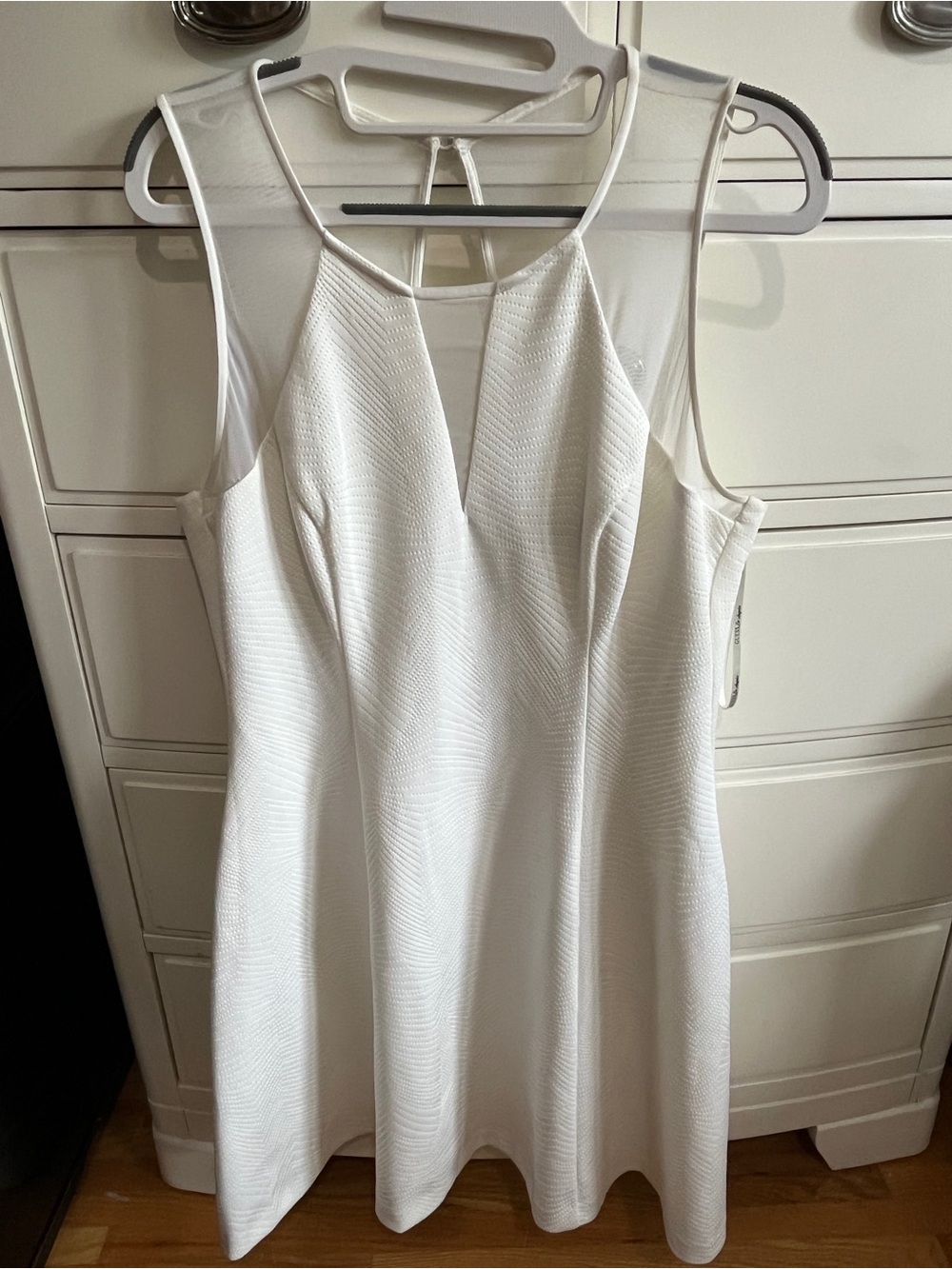 Guess White Sleeveless Mini Dress with Mesh Yoke and V-Neck
